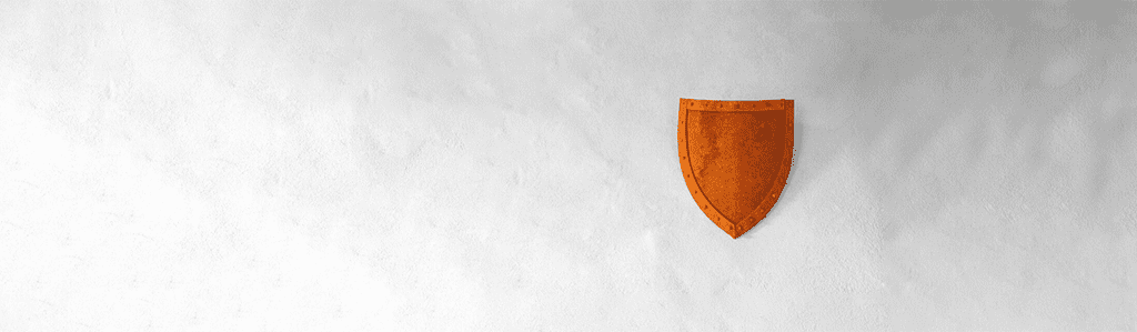 A orange shield on a wall